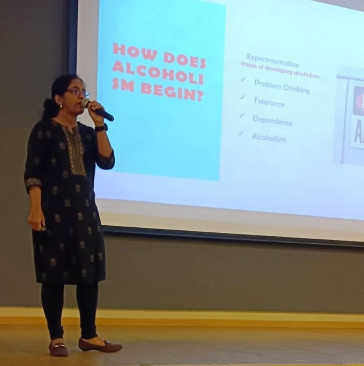 Aparna Rajeev speaking at a mental health workshop or conference